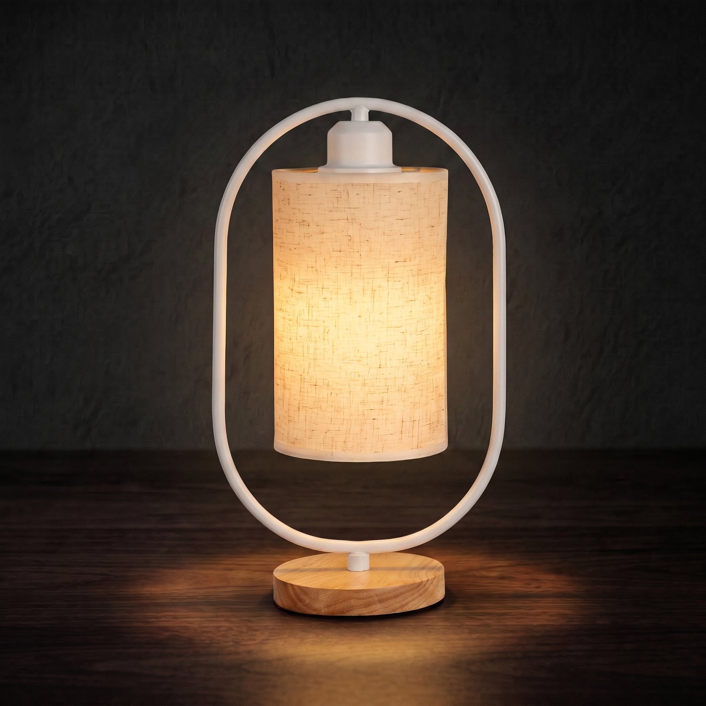 Minimalist bedside table lamp in black colorway — matte finish with warm LED glow