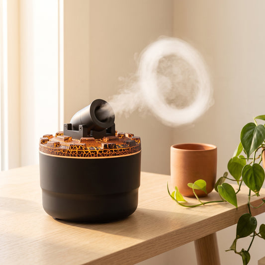 Matte black cannon ring diffuser front view — cordless cylindrical body with ambient LED base
