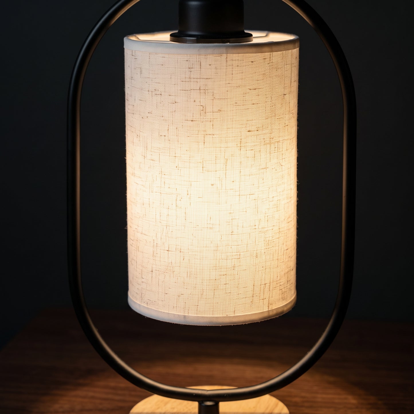 Minimalist bedside table lamp tighter studio shot showing proportions and base