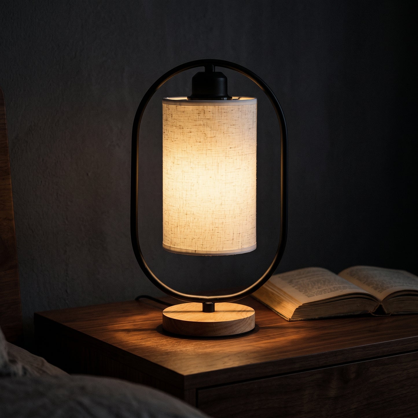 Minimalist bedside table lamp in white — slim cylindrical design with linen shade