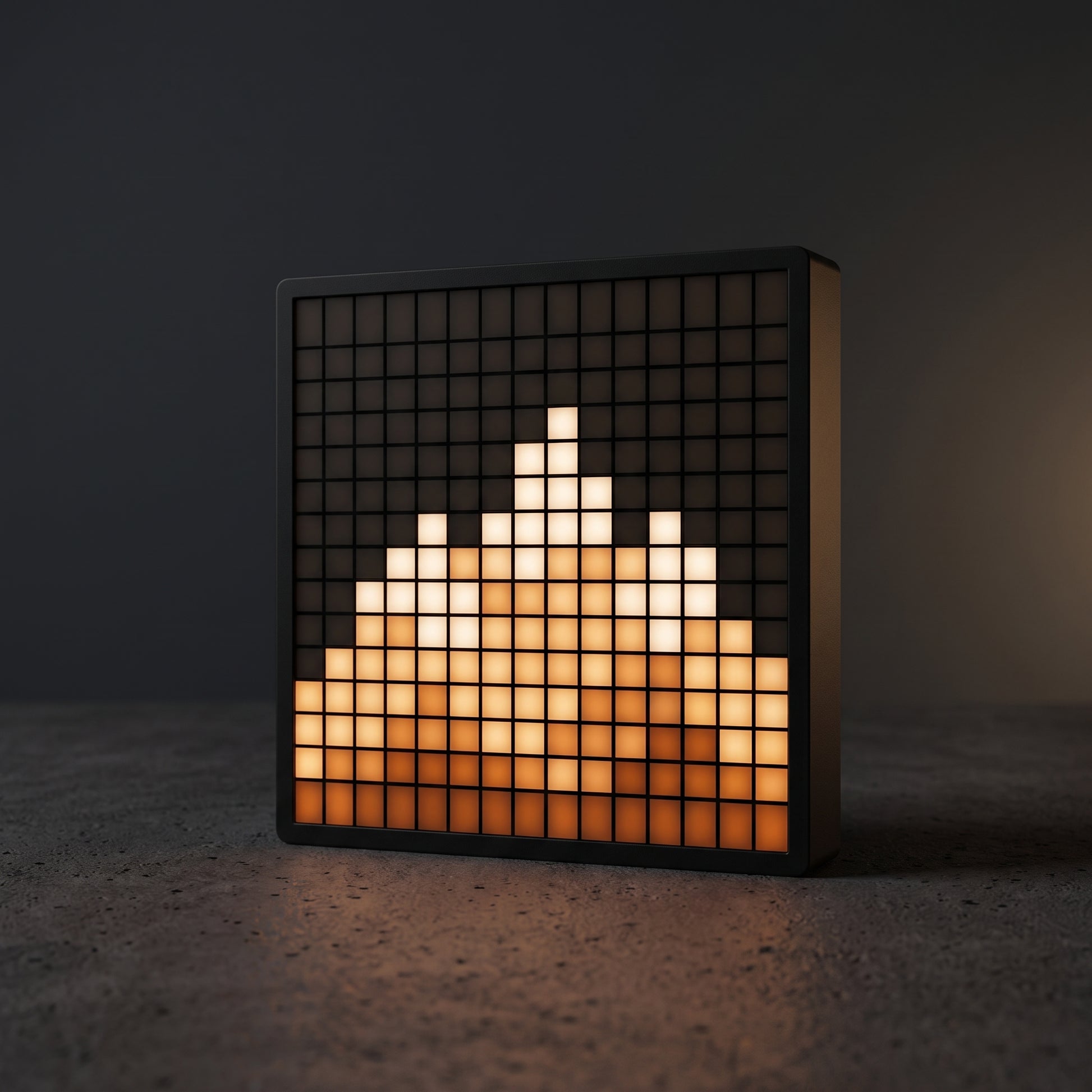 Pixel art Bluetooth LED display on a desk showing custom animation: 16x16 pixel screen