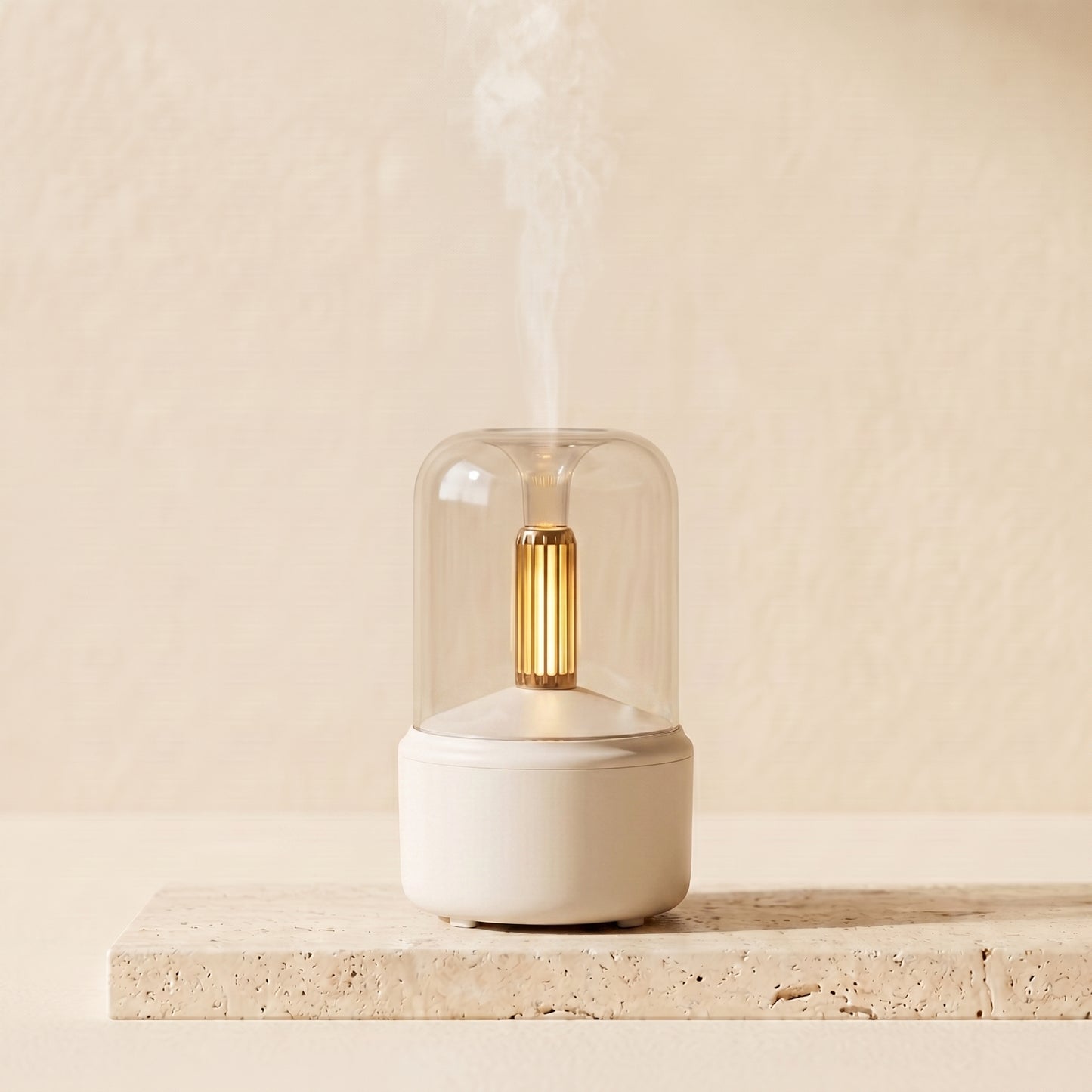 Candlelight aroma diffuser in matte black with amber LED glow