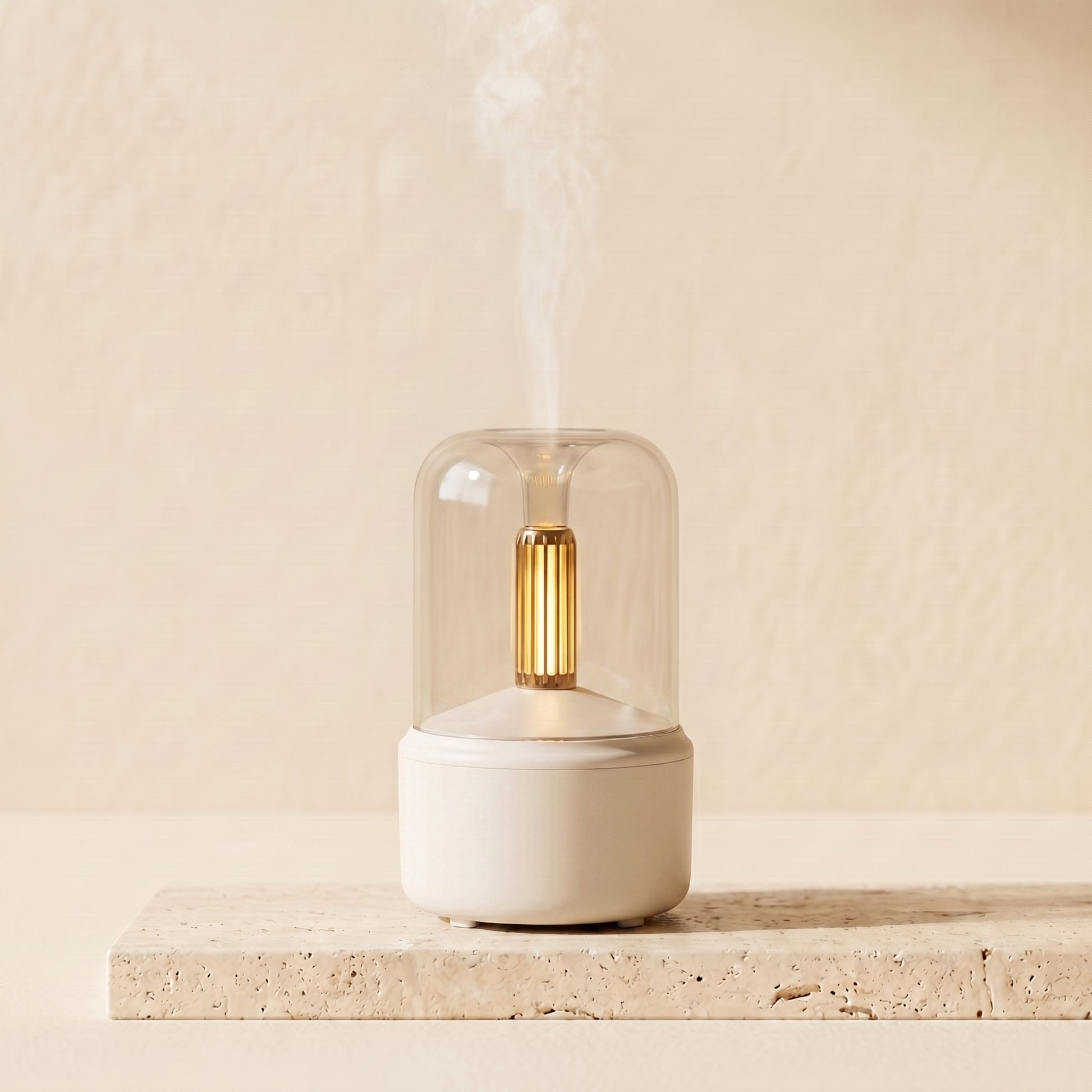 Candlelight aroma diffuser in matte black with amber LED glow