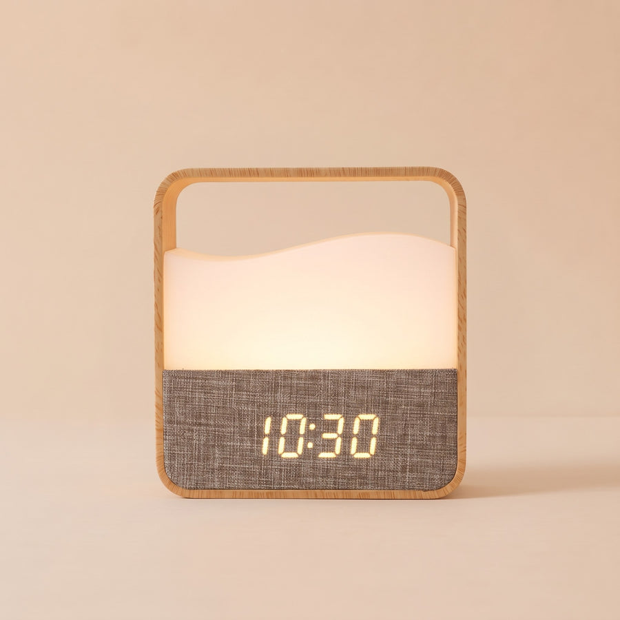 Bedside Clock Lantern in wood grain, lit warm white above a fabric clock panel showing 10:30